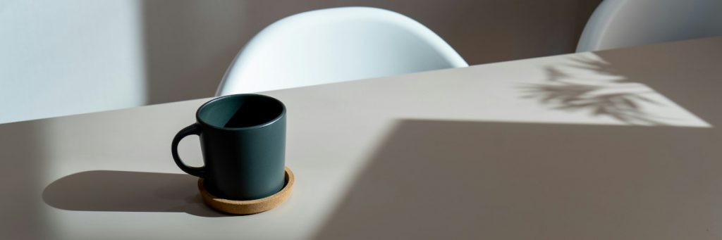 Mug on table in sunlight